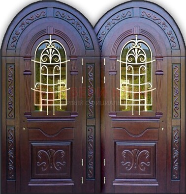 Индивидуальная арочная дверь со стеклом и ковкой ДА-19 в Ногинске