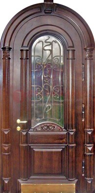 Арочная металлическая дверь массив со стеклом и ковкой ДА-50 в Ногинске