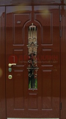 Красивая металлическая дверь со стеклом и ковкой ДСК-33 в Ногинске